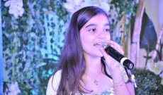 كريستا ماريا تتألّق غناءً وترنيماً في مهرجان إذاعة صوت الرب في مونتريال – كندا